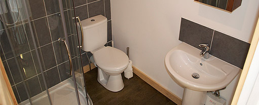 An image of the brand new annex bathroom, complete with luxury power shower.